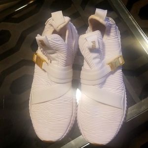 All white, Puma sneakers size 9, worn once